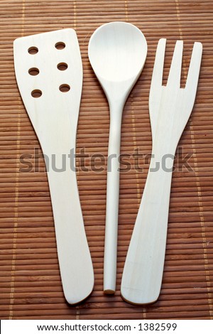 Kitchen accessories on bamboo background