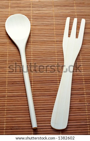 Kitchen accessories on bamboo background