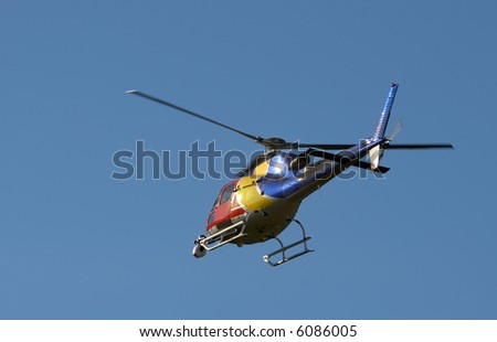 A TV news helicopter with a camera