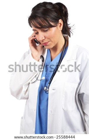 Friendly female doctor in lab coat with stethoscope talking with phone