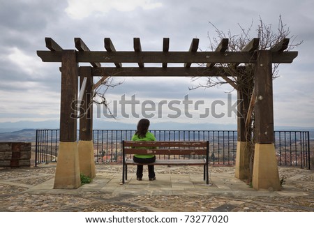 Lonely woman looking at the landscape, Labastida, Alava, Spain
