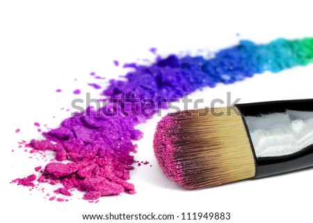 Professional make-up brush on rainbow crushed eyeshadow Professional make-up brush on rainbow crushed eyeshadow