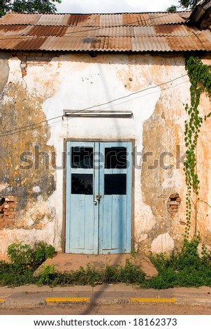 door of a rundown house