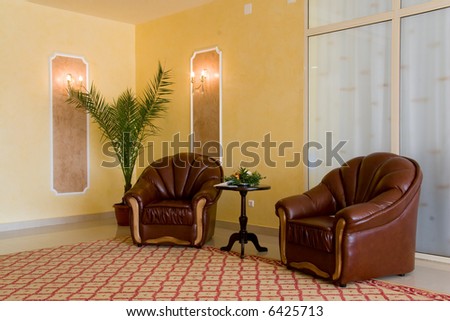 Hotel modern reception: indoor design, armchair, table