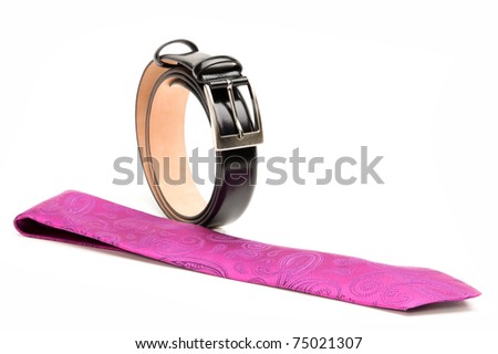 men\'s accessories: black belt and pink tie