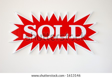 bright red sold sign