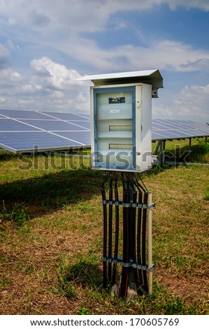 Electricity box and solar panels at solar power plant