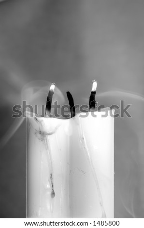 Three candles in black and white
