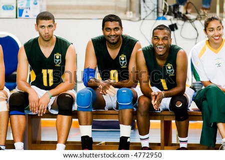 Volley ball players sitting on the bench in Universiade Game.