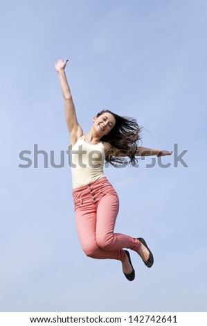 happy woman joyful leaping
