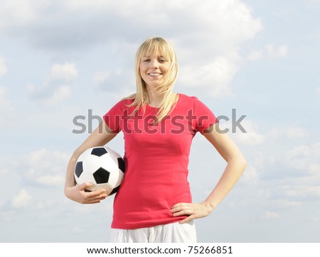 young woman with soccer ball