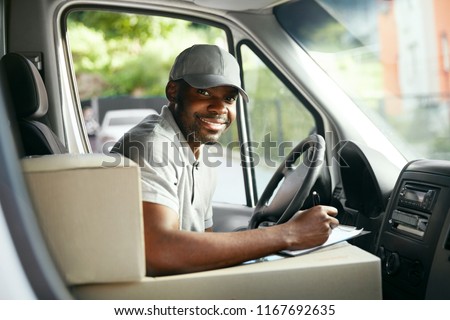 Courier Delivery. Black Man Driver Driving Delivery Car