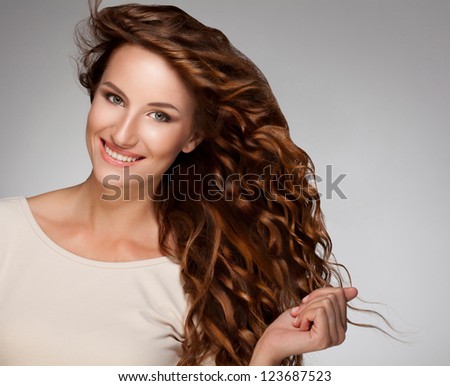 Red Hair Beautiful Woman with Curly Long Hair High quality image Red Hair Beautiful Woman with Curly Long Hair High quality image