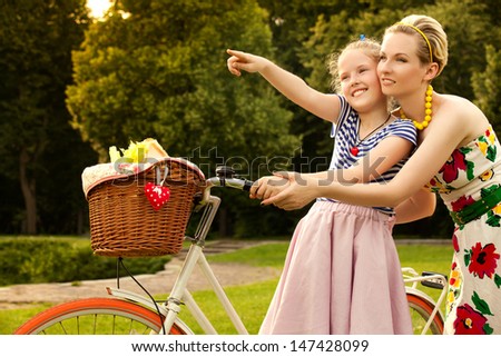 Happy family. Beautiful woman and young girl smiling. Mother day. Mother and Daughter