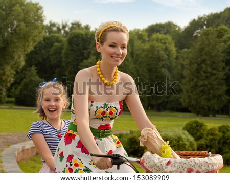 Young Mother and Daughter Playing. Mother day. Happy family.