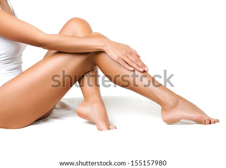 Long Woman Legs isolated on white. Depilation