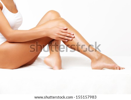 Long Woman Legs Isolated On White. Depilation