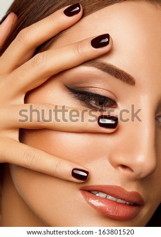 Beautiful Woman With Black Nails. Makeup And Manicure.