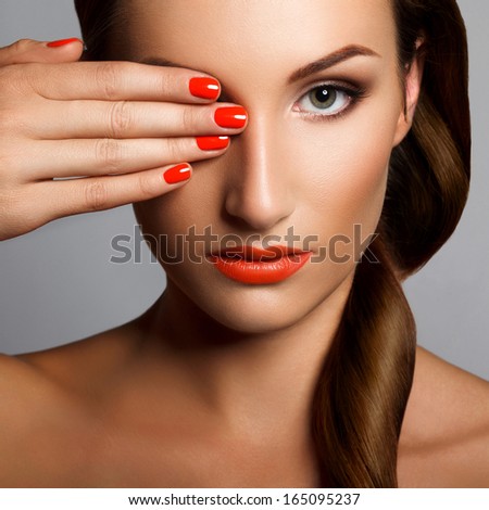 Beautiful Woman With Red Nails Makeup and Manicure Red Lips Beautiful Woman With Red Nails Makeup and Manicure Red Lips