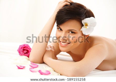 Spa Woman. Close-up of a Beautiful Woman Getting Spa Treatment Spa Salon.