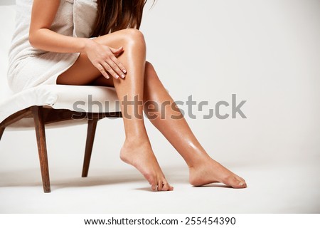 Long Woman Legs . Beautiful Woman Cares About Legs. Depilation