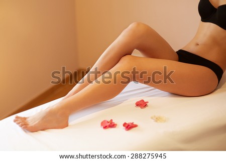 Long Woman Legs. Young Woman Cares About Her Legs.