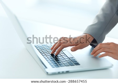 Closeup Portrait of Woman\'s Hand Typing on Computer Keyboard