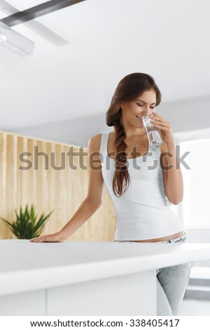 Drink Water. Happy Beautiful Woman Drinking Fresh Pure Water. Healthcare. Drinks. Healthy Eating. Healthy Lifestyle. Health, Beauty, Diet Concept.