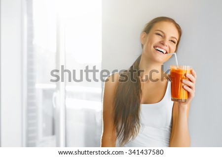 Healthy Lifestyle. Closeup Of Beautiful Smiling Vegetarian Woman Drinking Fresh Raw Detox Vegetable Juice. Healthy Food Eating, Diet And Lifestyle Concept. Drinks. Beauty Concept.