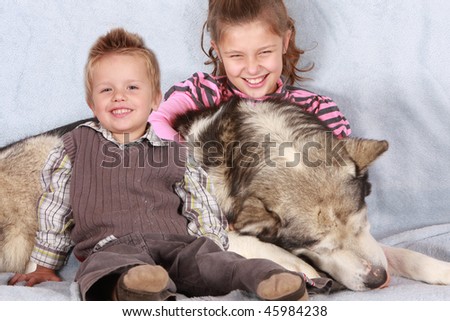 big dog and his happy owners