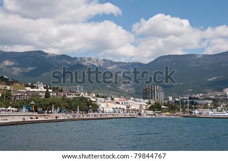 Blue sea, sky and white clouds. Bright summer day. Black Sea, Yalta, Crimea, Ukraine