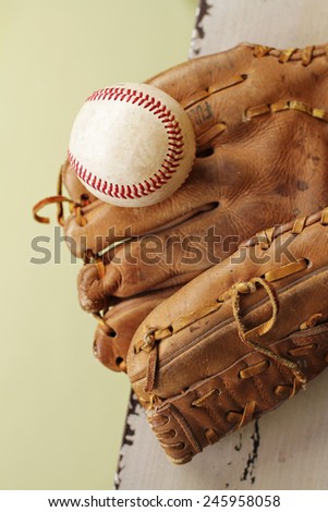 Used, worn out baseball and glove or mitt, copyspace