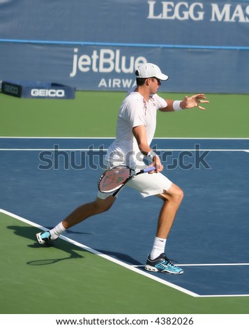 Unique shot of John Isner, a rising pro tennis star, preparing for a forehand shot at Leggmason 2007. It was his first big pro tournament where he got defeated in the final by Andy Roddick.