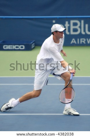 Unique shot of John Isner, a rising pro tennis star, preparing to volley at Leggmason 2007. It was his first big pro tournament where he got defeated in the final by Andy Roddick.