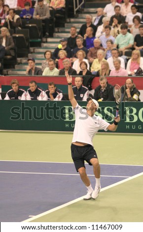 Bob Bryan serving during the doubles team match against France at the US-France match on April 12, 2008 in Winston Salem.