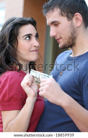 Money matters: young couple / family arguing over money. Suitable for a variety of financial crisis, budget, family themes