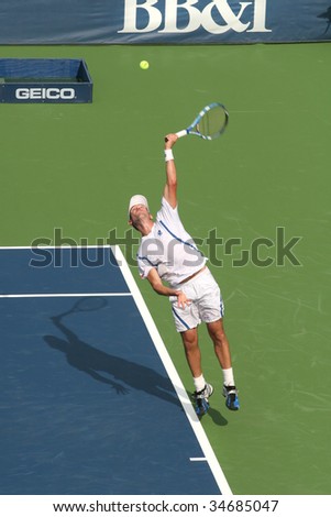 WASHINGTON DC- AUGUST 2: Wayne Odesnik (picture) serves to Paul Capdeville at a match during Leggmason Tennis Classic tournament August 2, 2009 in Washington DC. Odesnik won 4-6, 6-2, 6-4.