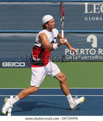 WASHINGTON DC- AUGUST 3:  Robert Kendrick (picture) hits a volley against Mikhail Youzhny during Leggmason Tennis Classic tournament on August 3, 2009 in Washington DC. Kendrick lost the match