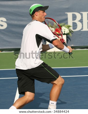 WASHINGTON DC- AUGUST 4:  Lleyton Hewitt  (picture) hitting a volley during a doubles match at Leggmason Tennis Classic tournament on August 4, 2009. Hewitt and partner Chris Guccione won the match.