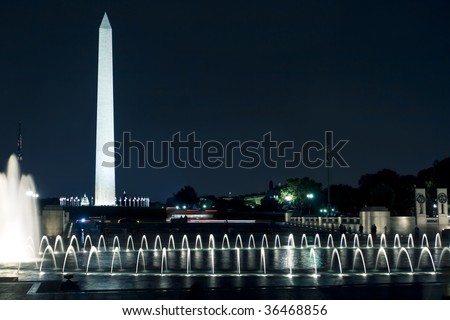 View of the Washington Monument and Capitol in DC at night