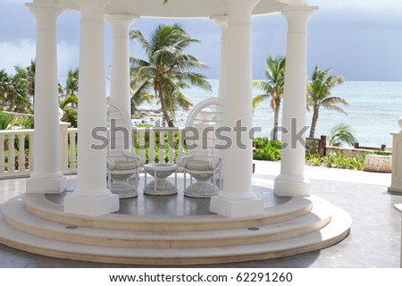 Tropical wedding setting: white gazebo against a Caribbean ocean