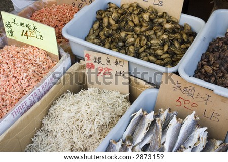 dried shrimp, dried fish, oysters, mussels, dried shredded fish, labeled and priced, at the seafood market in China town