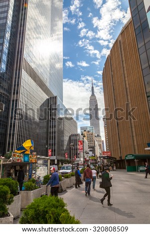 NEW YORK, USA - SEPTEMBER 30, 2009: Street in front of Madison Square Garden near famous Empire State Building, Manhattan, New York, USA.