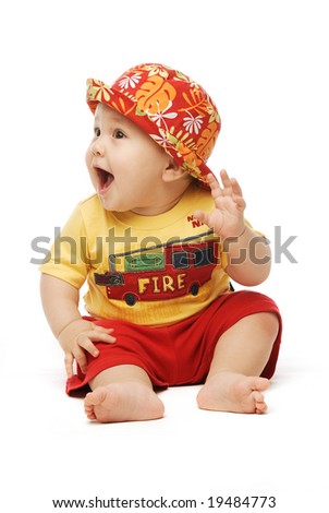 stock-photo-baby-in-bright-cloths-sitting-his-hand-to-his-ear-mouth-open-looking-puzzled-19484773.jpg