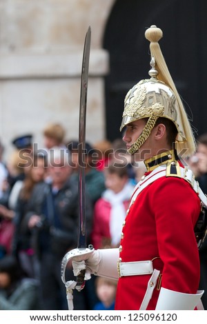 LONDON  - APRIL 13: A royal guard Horse Guards, during the Changing of the Guards ceremony in London, England
