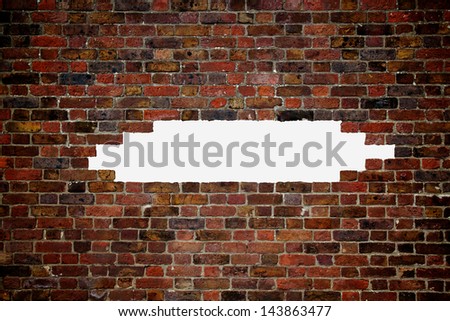 Very old brick wall - with a hole in the middle isolated on white