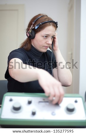 ear exam with headphones