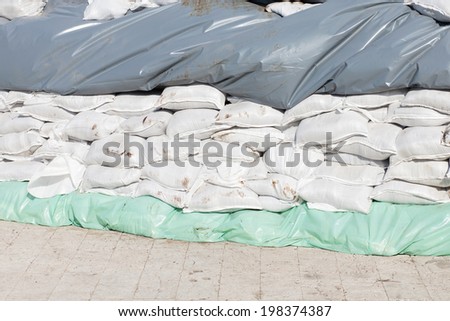 pile of sand bags for flood protection