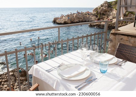 empty restaurant table by the sea
