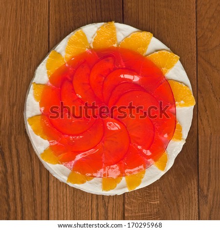 Fruity jelly cake on a wooden table